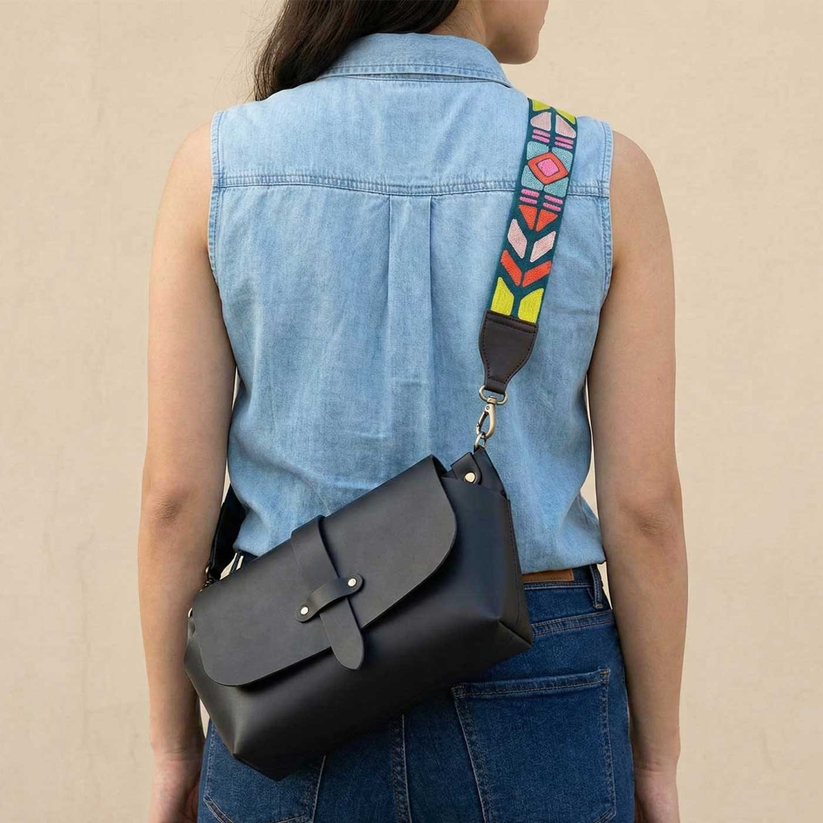 Flap bag with colorful handmade embroidered straps