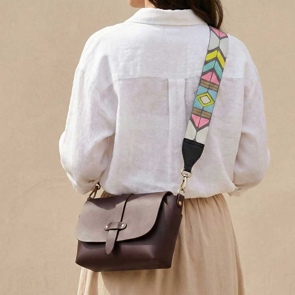 Flap bag with colorful handmade embroidered straps